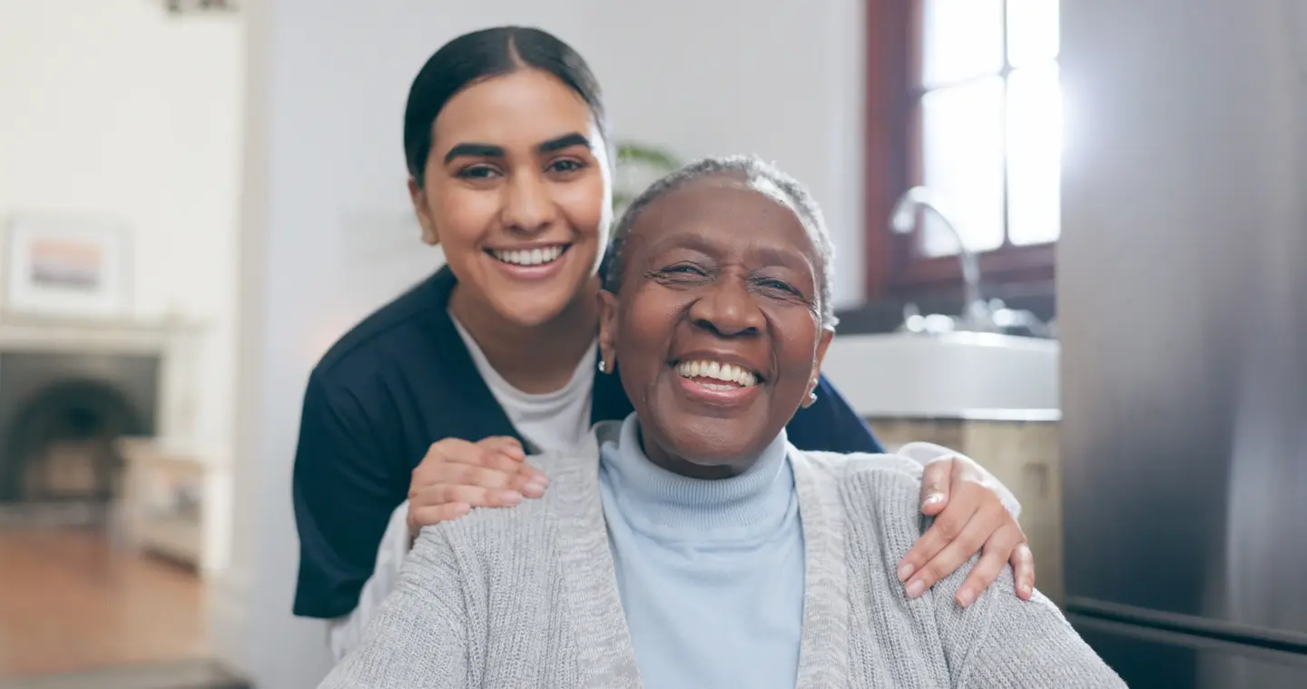 home carer with smiling patient